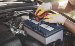 Checking a car battery during summer